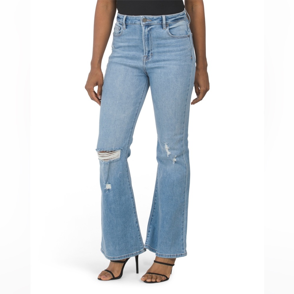 Hidden distressed flare jeans